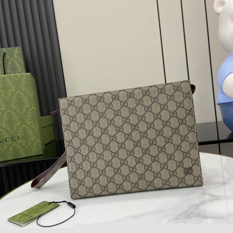 G*u*i clutch bags